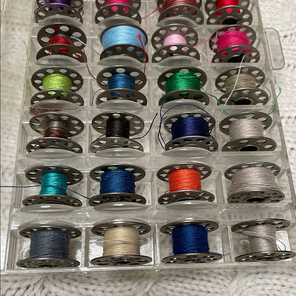 32 VTG metal bobbins with Colorful Thread. Various thread amounts remain
